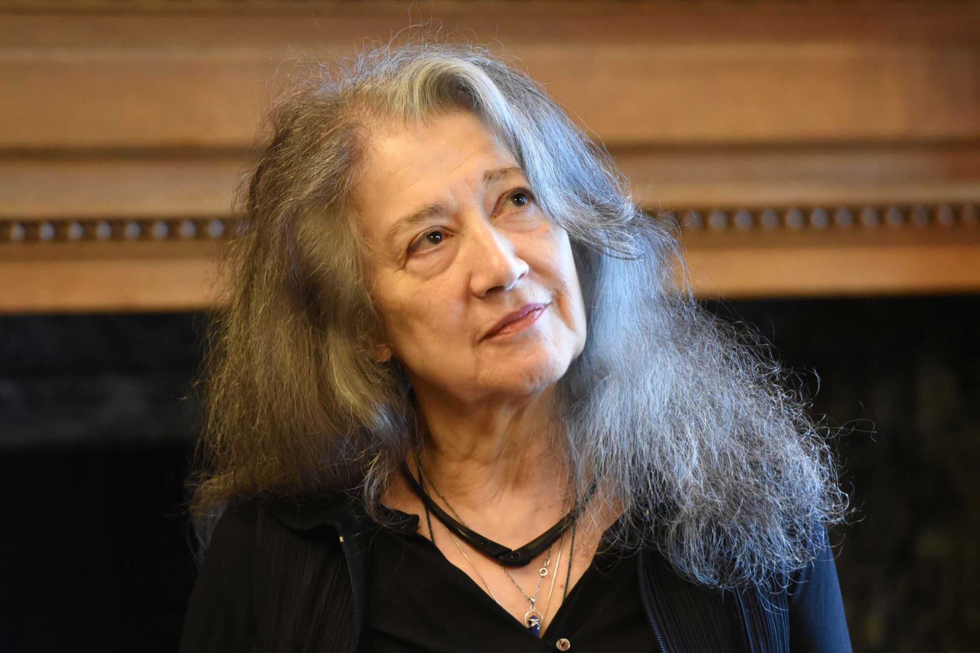 Pianist Martha Argerich signs the Golden Book Petr Popelka conducting in the Great Hall